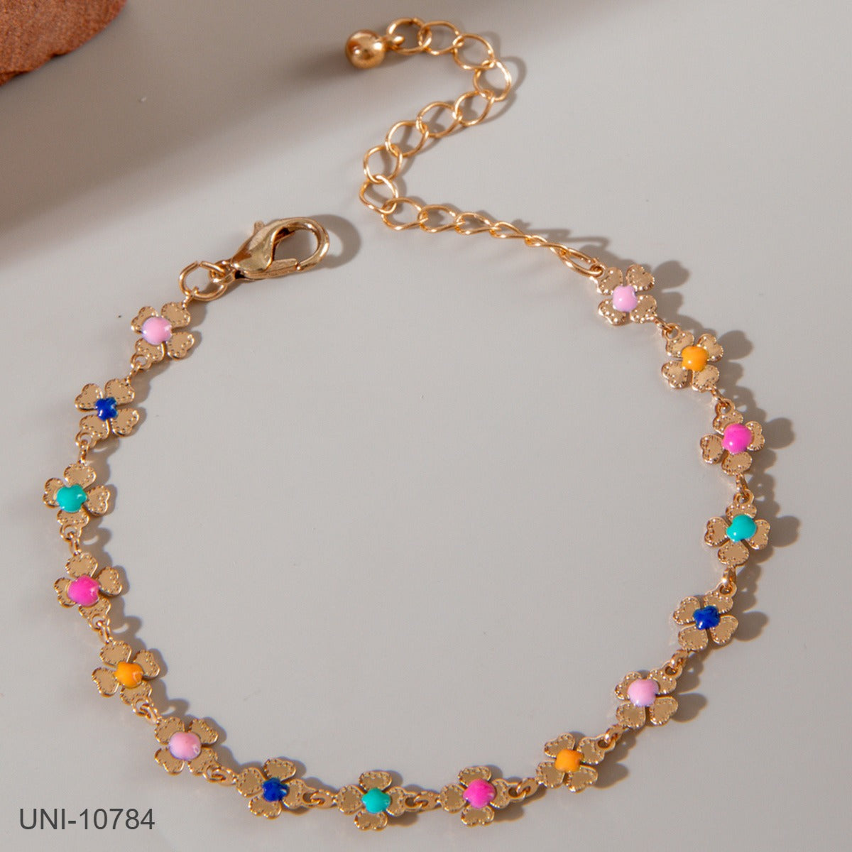 UNI-10784 - Multi Flower Gold - Bracelet