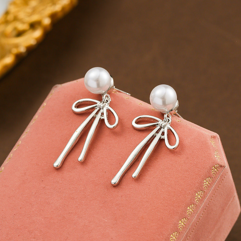 UNI-10321 - Dangling Pearl Bow - Earring