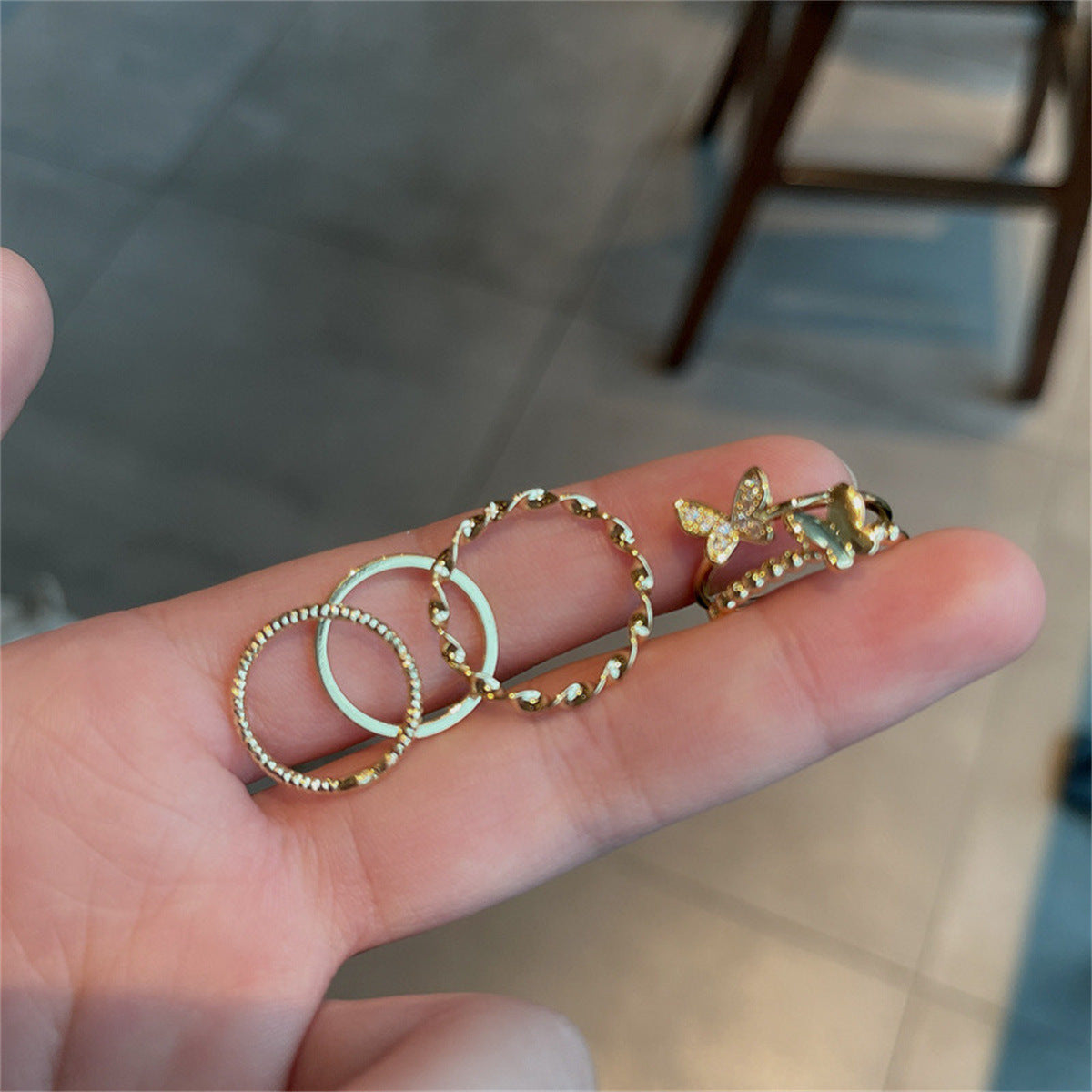 UNI-11140 - Gold Foil Butterfly Ring Set Of 4