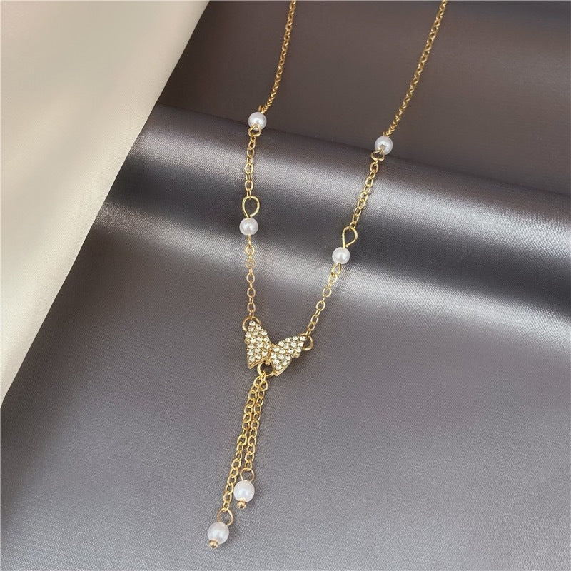 UNI-11171 - Pearl & Gold Butterfly Charm - Necklace