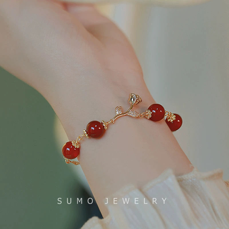 UNI-12307 - Red Beads Gold Flower - Bracelet