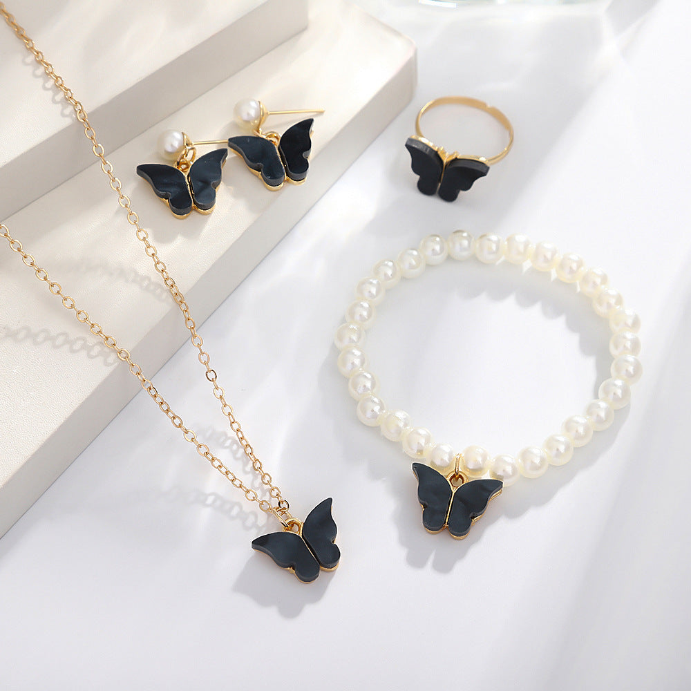 UNI-10556 - Black Butterfly Pearl Gold - Jewelry Set