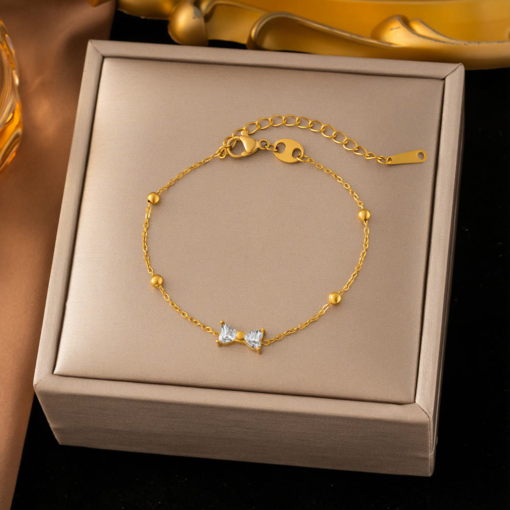 SS-12518 - Diamond Bow Gold - Bracelet