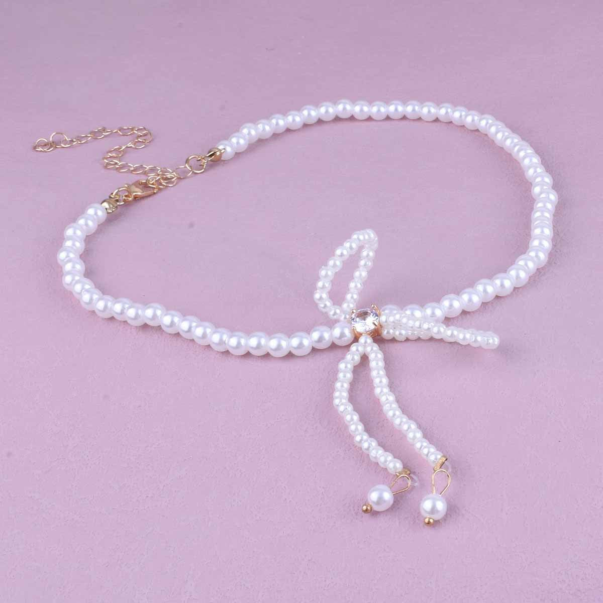 UNI-10509 - Pearly Bow - Necklace