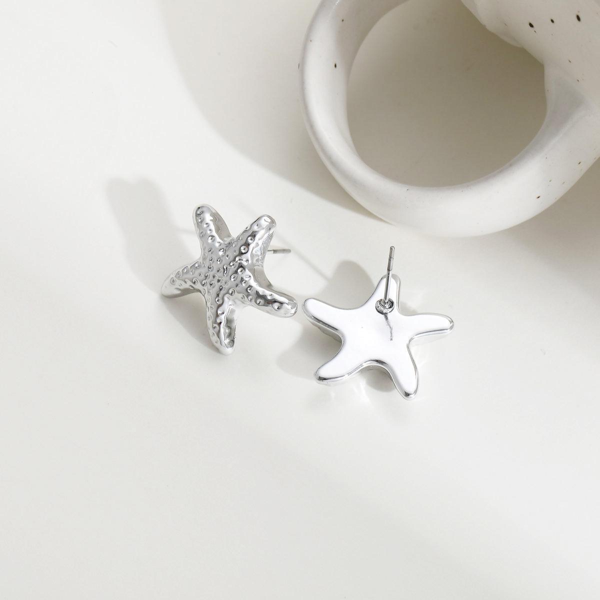 UNI-10659-1 - Silver Starfish - Earring