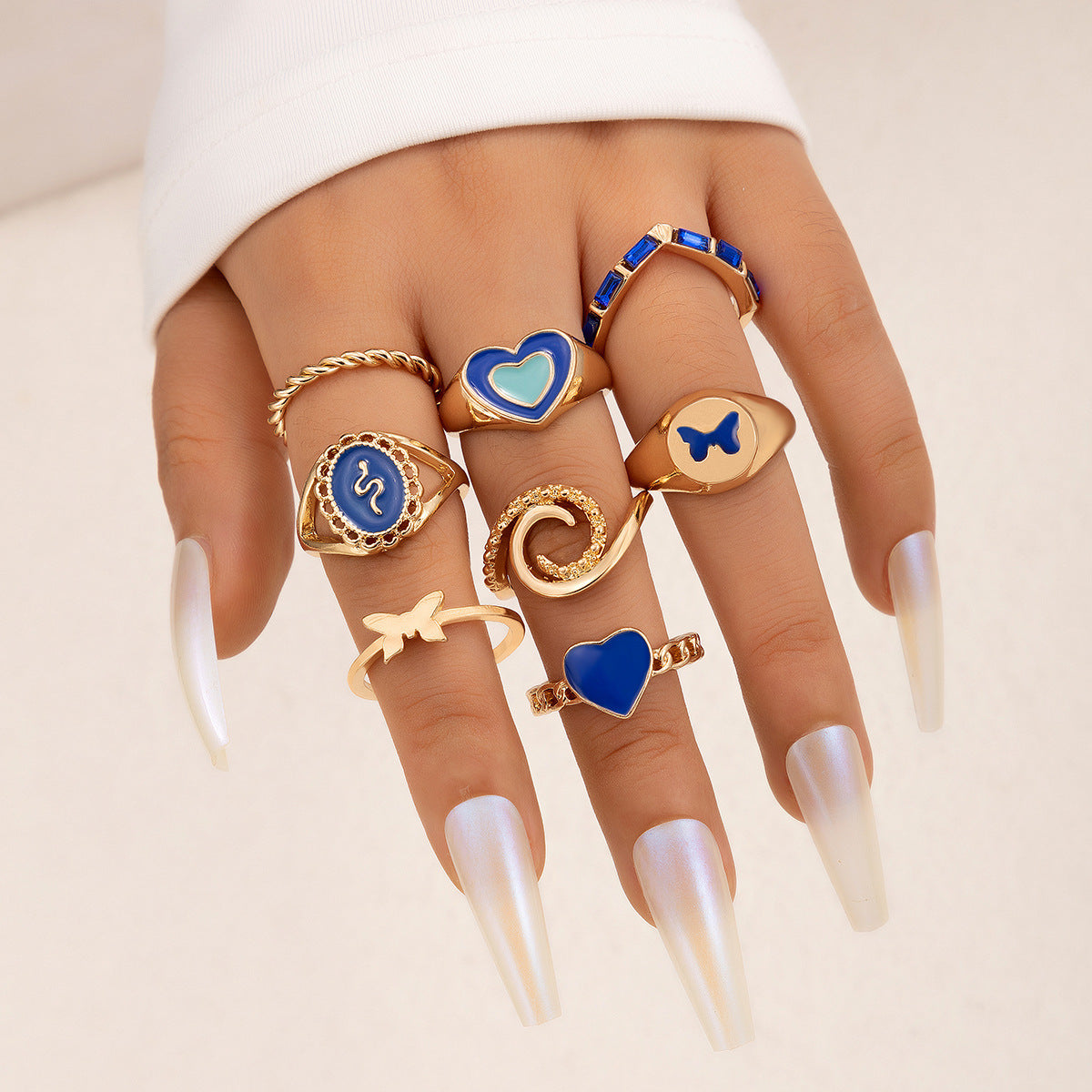 UNI-10771-1 - Blue Heart & Gold Enameled - Ring Set Of 8