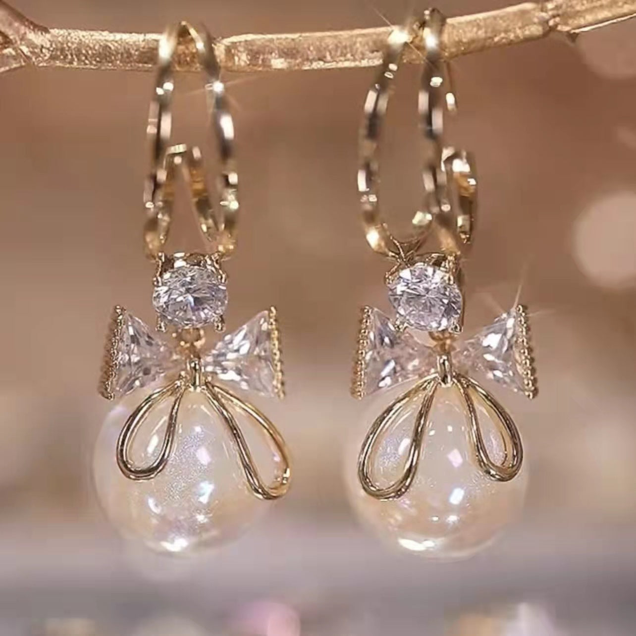 UNI-10583 - Bow Pearl Gold - Earring