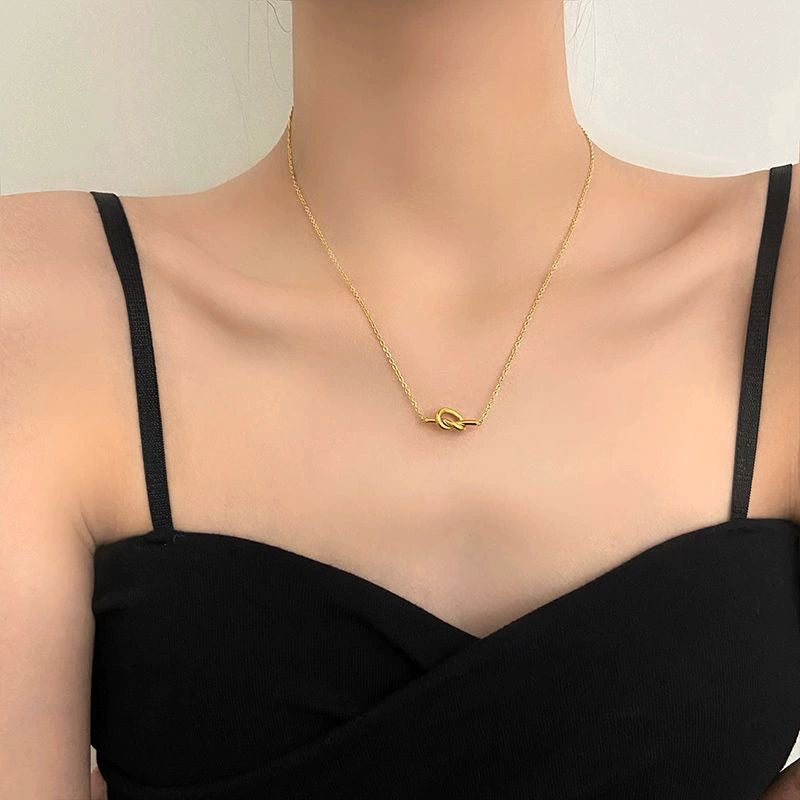 UNI-12268 - Bow Knotted God - Necklace