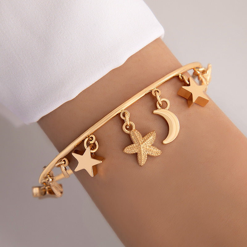 UNI-11092 - Moon & Star Charms Gold Bangle - Bracelet