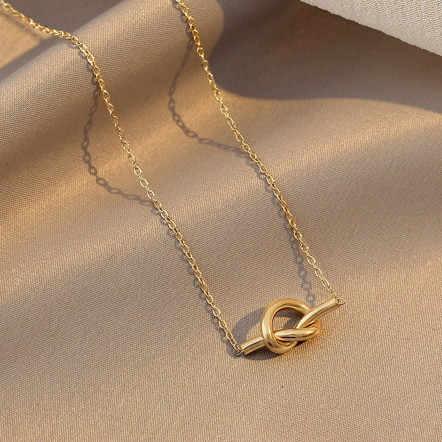 UNI-12268 - Bow Knotted God - Necklace