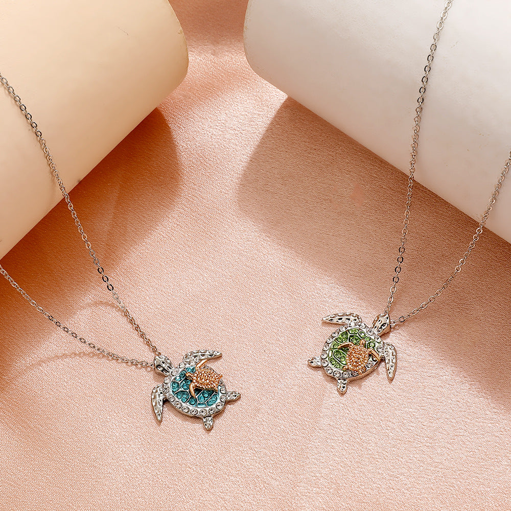 UNI-10962-1 - Blue Diamonds Gold Turtle Silver - Necklace