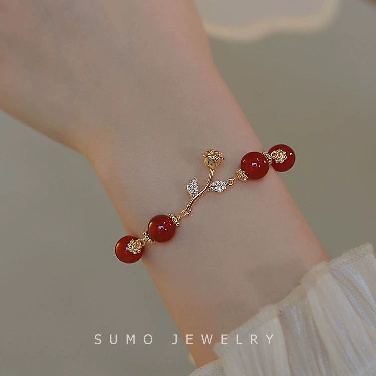 UNI-12307 - Red Beads Gold Flower - Bracelet