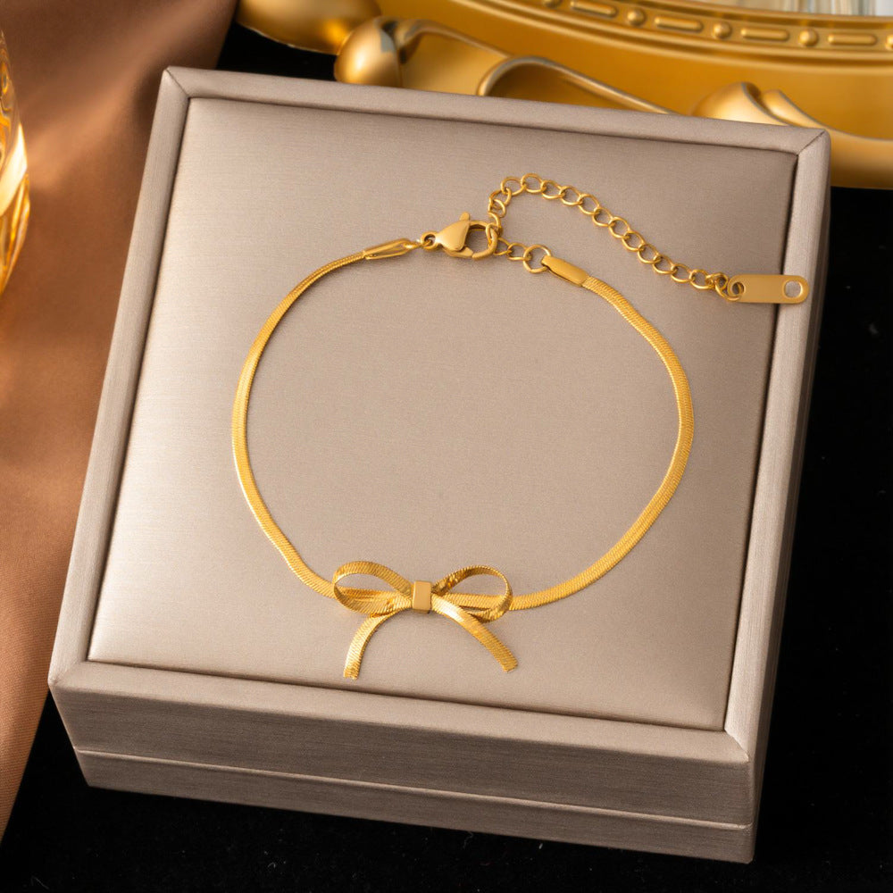 SS-12506 - Gold Bow - Bracelet