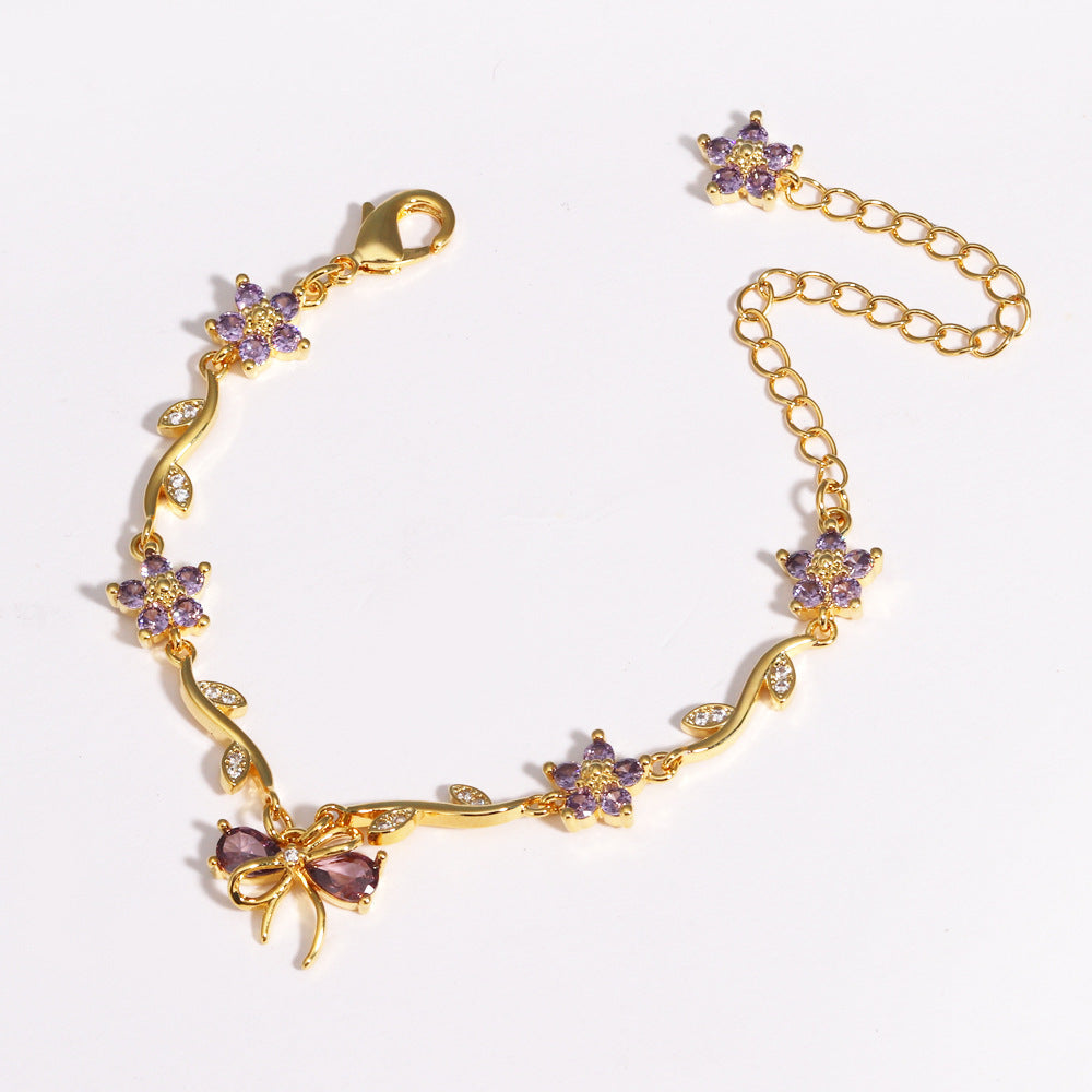 UNI-12208 - Purple Diamond Bow & Flowers Gold - Bracelet