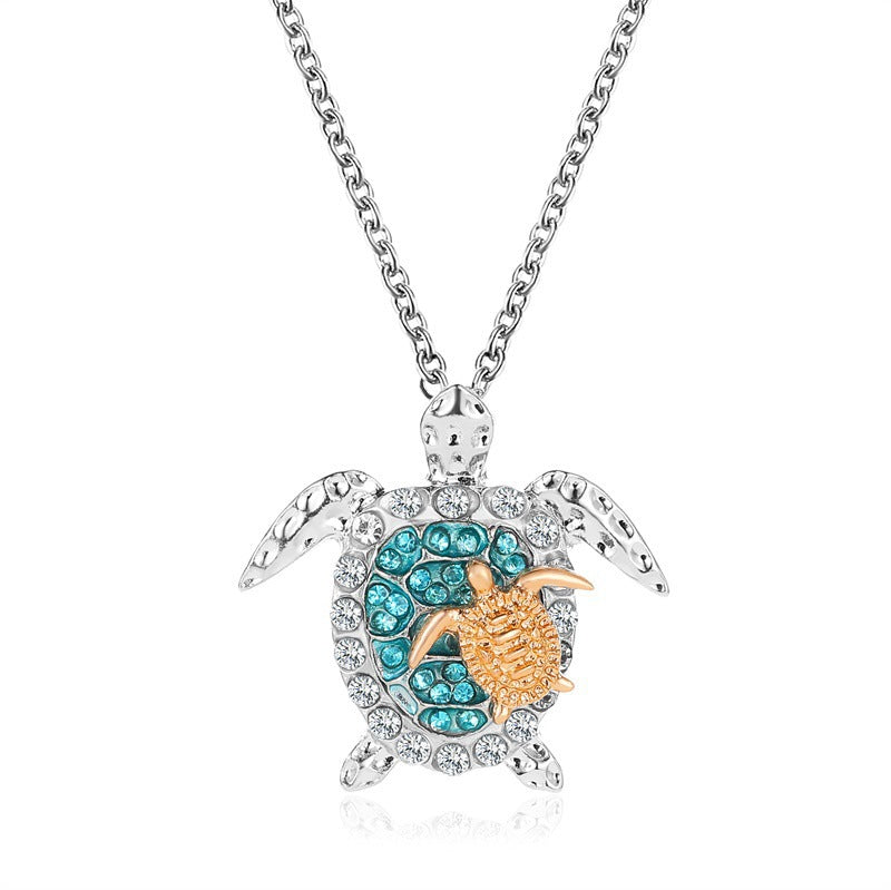 UNI-10962-1 - Blue Diamonds Gold Turtle Silver - Necklace