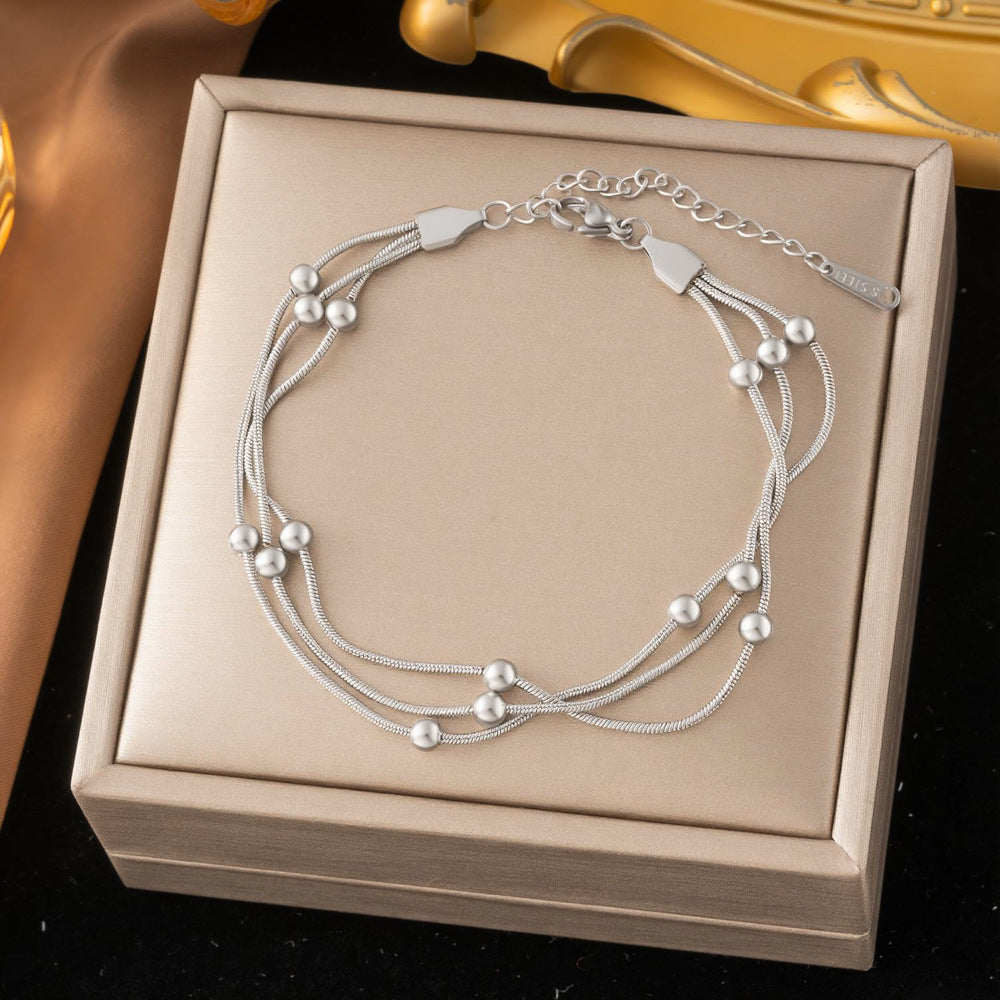 SS-12513 - 3 Layered Silver Beads - Bracelet