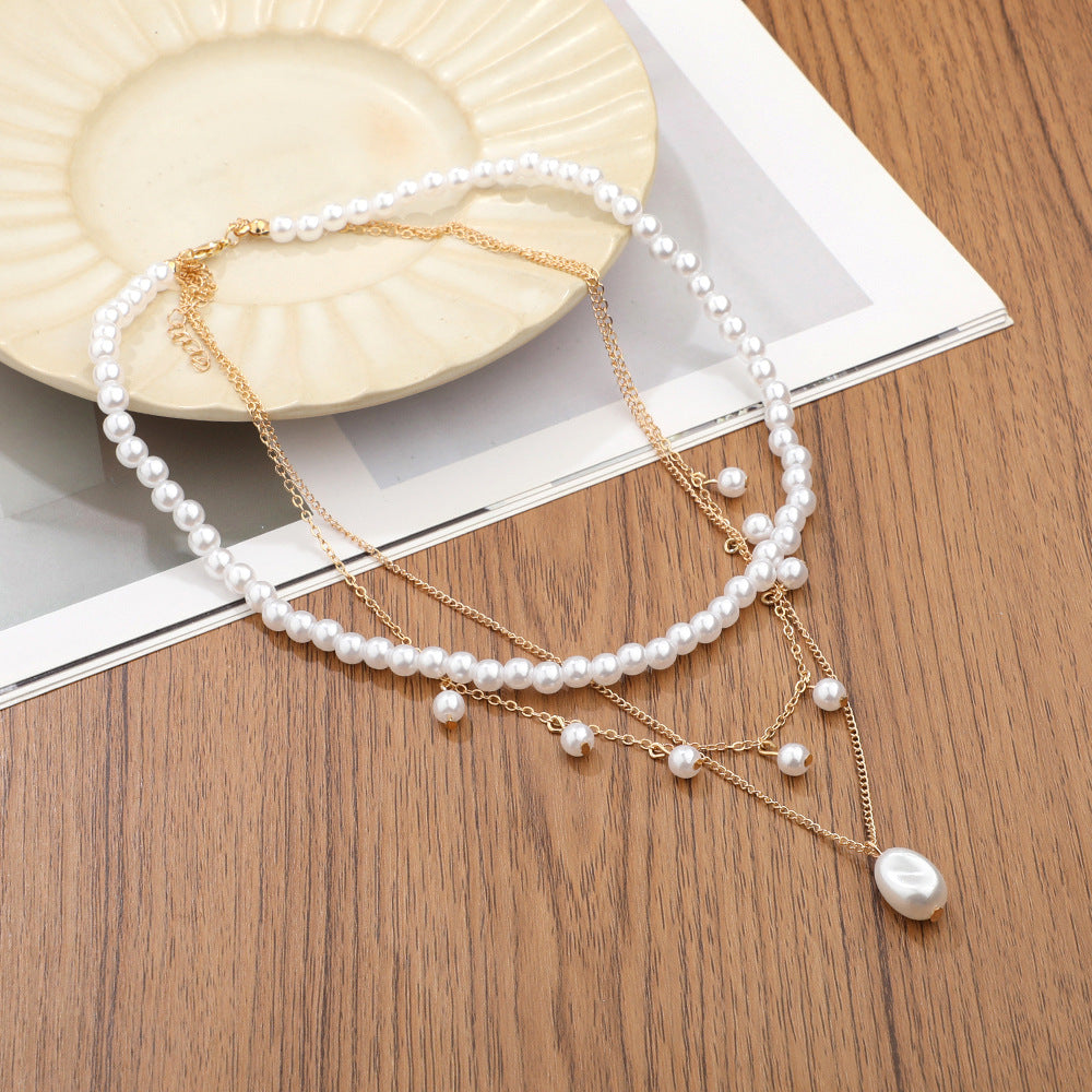 UNI-11222- 3 layered White Pearls Gold - Necklace