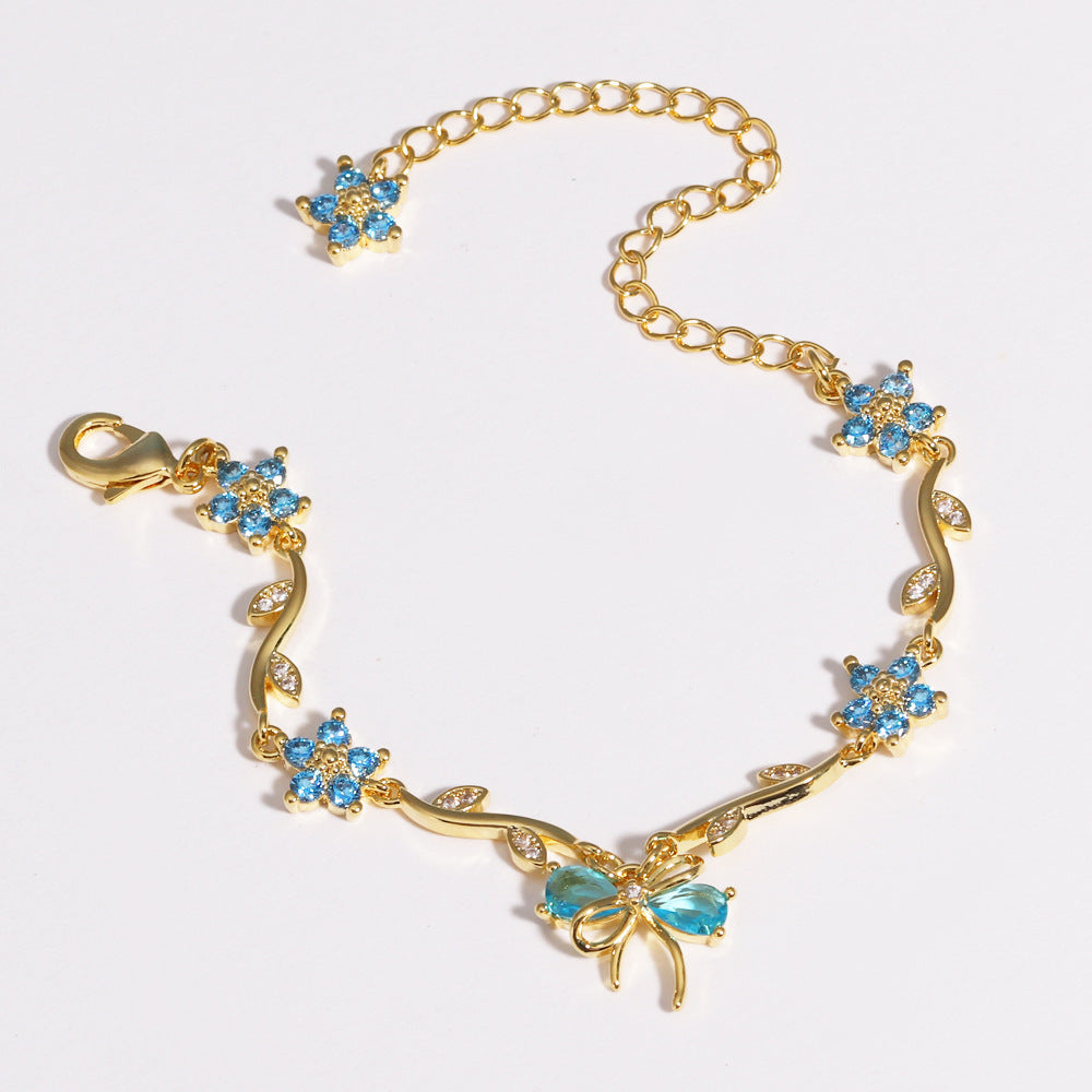 UNI-12212 - Blue Diamond Bow & Flowers Gold - Bracelet