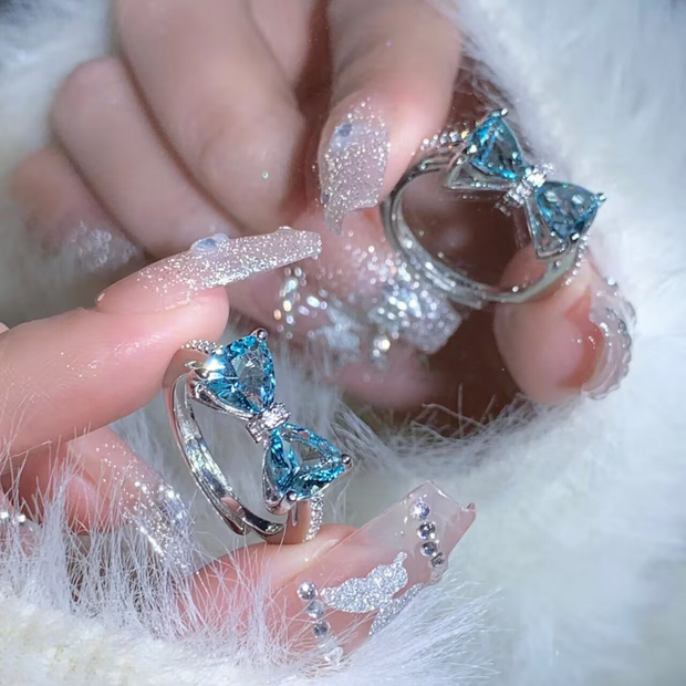 UNI-10175-4 - Blinky Blue Diamond Bow - Ring