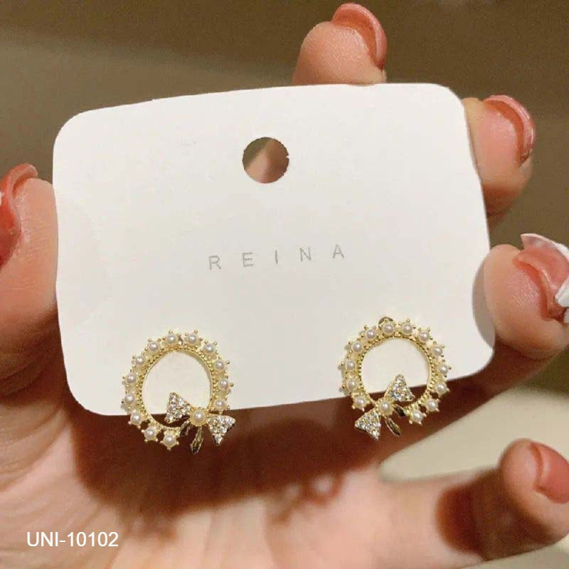 UNI-10102- Pearly Diamonds Bow Gold - Earring