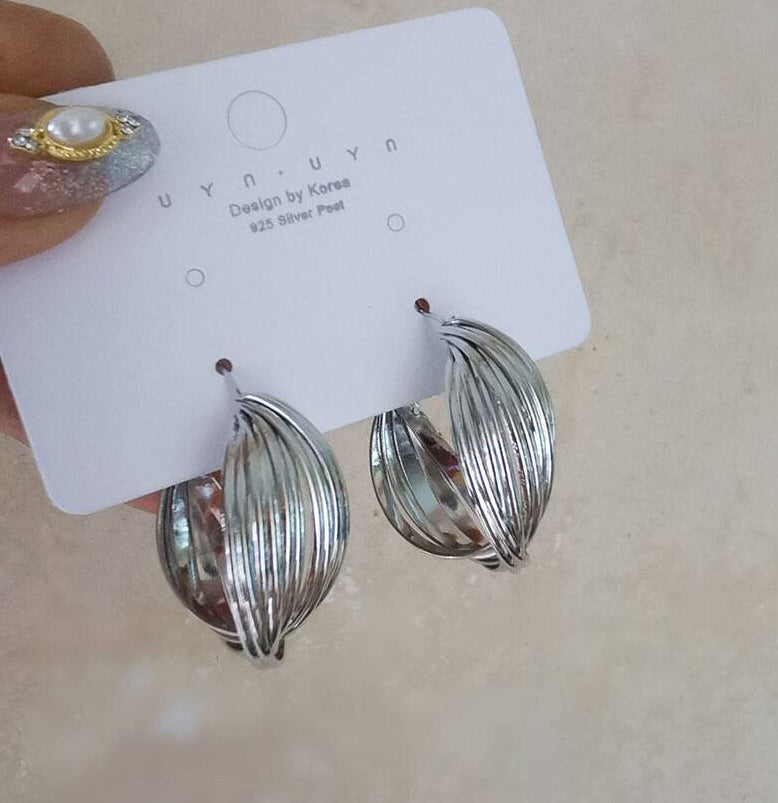 UNI-10226-1 - Fancy Twist Hoop Silver - Earring