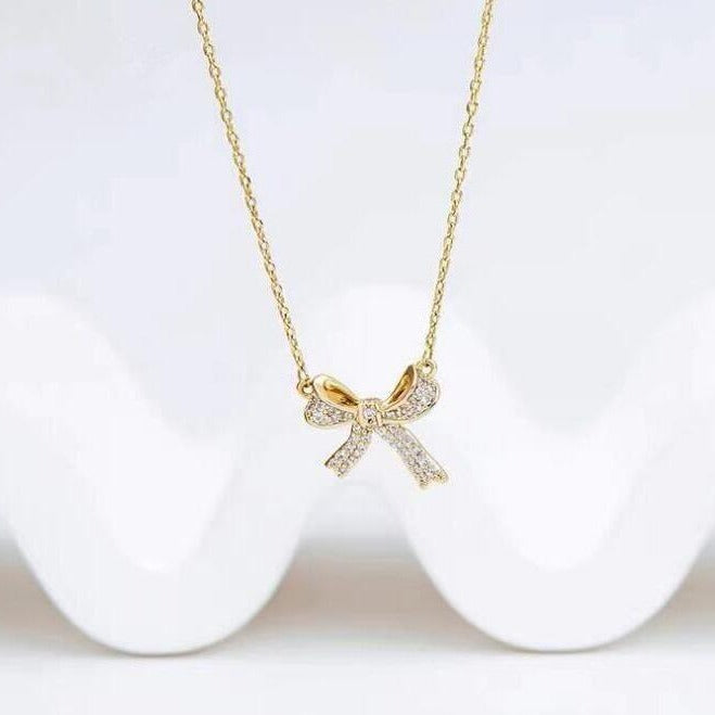 UNI-10233 - Bow Sparkle Gold - Necklace