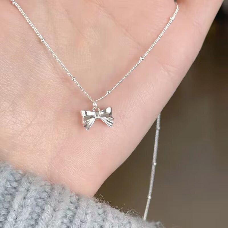 UNI-10274 -  Bow Silver - Necklace