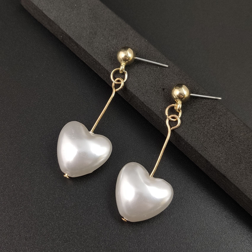 UNI-10444 - Dangling White Heart Gold - Earring