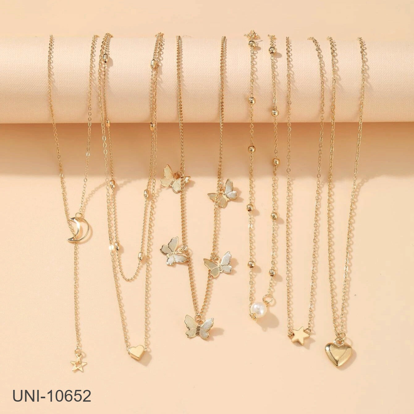 UNI-10652 - Pearl & Butterfly Gold  - Necklace Set Of 6