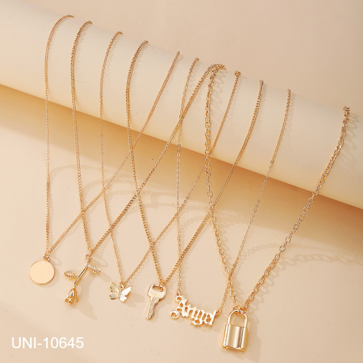 UNI-10645 -  Gold Flower & Cuties - Necklace Set Of 6
