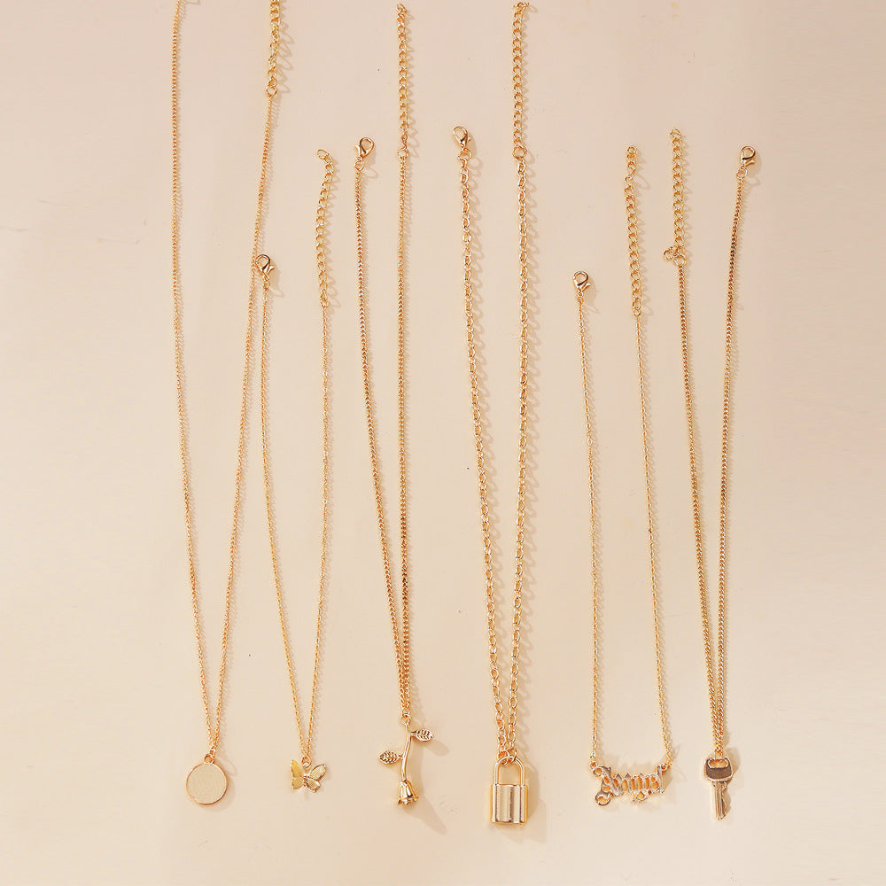 UNI-10645 -  Gold Flower & Cuties - Necklace Set Of 6