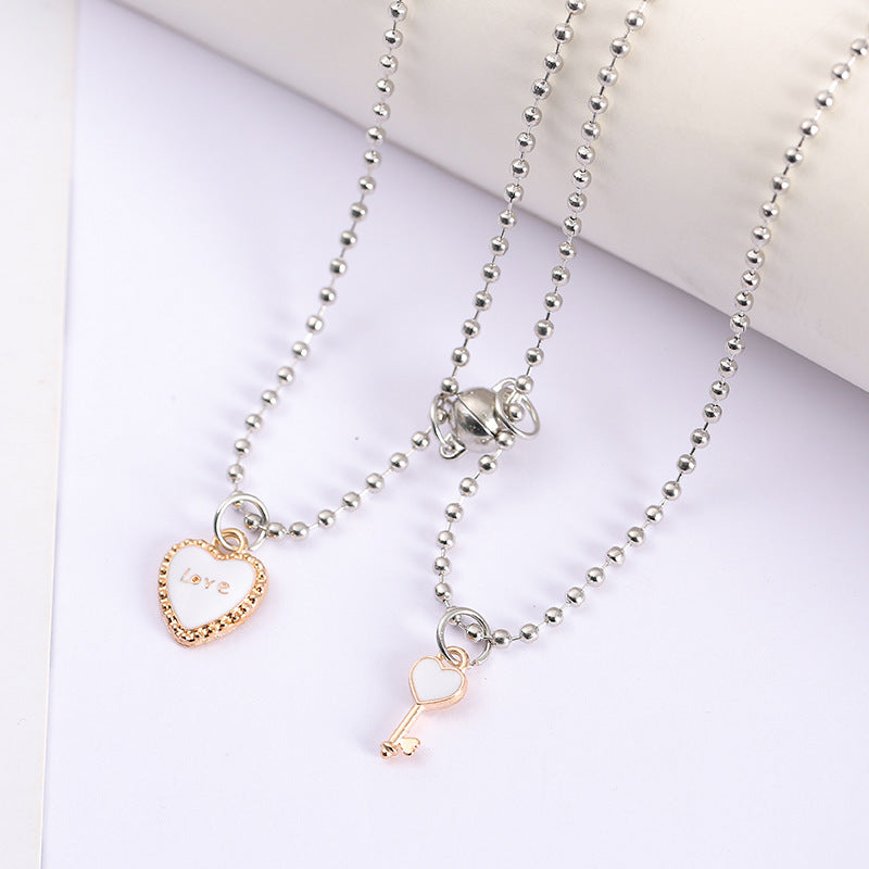 UNI-11805 - White Love Lock & Key Magnetic - Necklace Set Of 2
