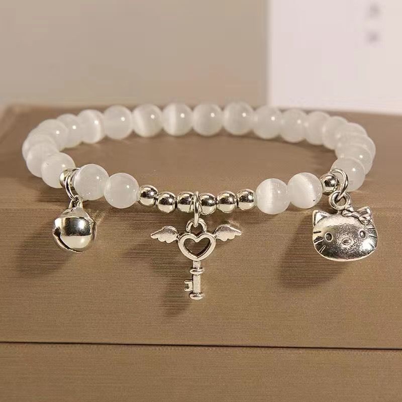 UNI-11175 - Silvers Charms & White Stone - Bracelet