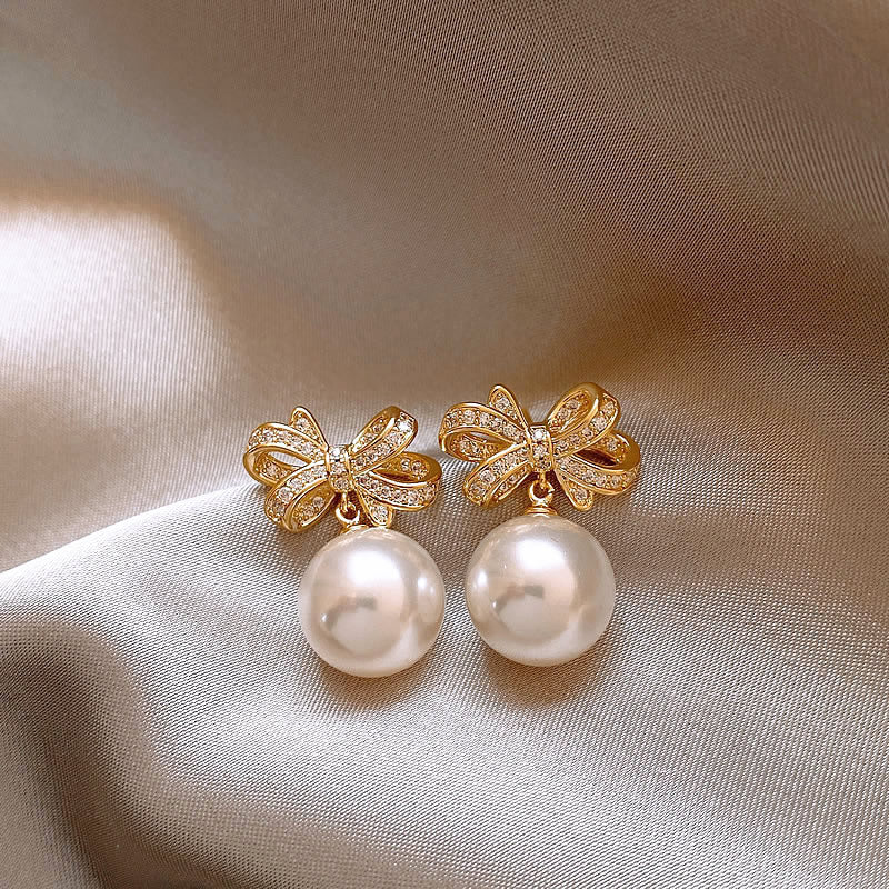 UNI-12054 - Pearl & Bow Gold  - Earring