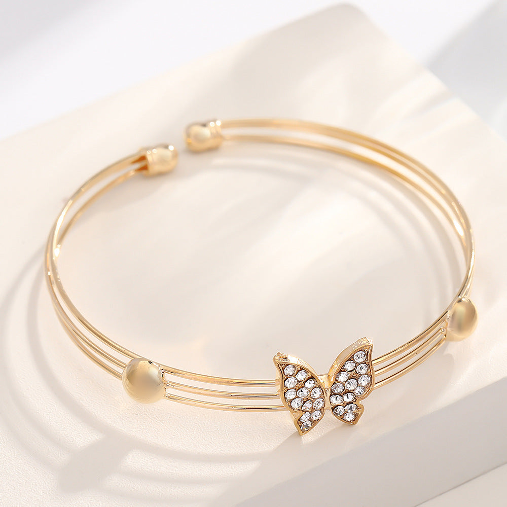 UNI-10553 - Blinky Butterfly Gold  - Jewelry Set