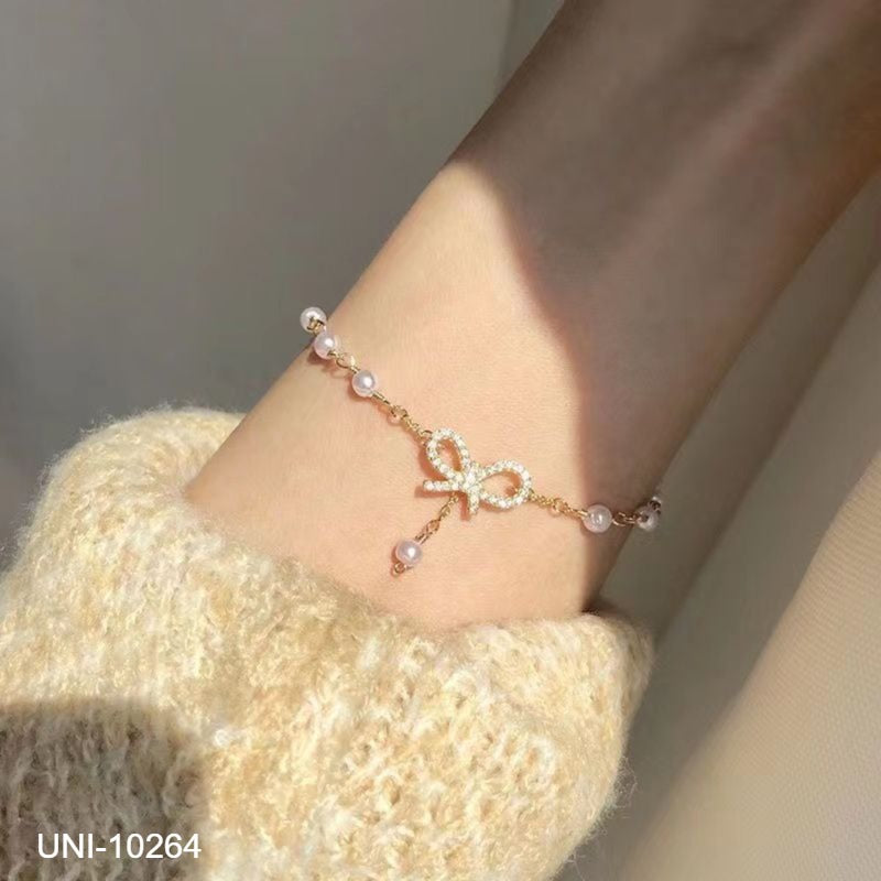 UNI-10264 - Pearl Bow Gold - Bracelet