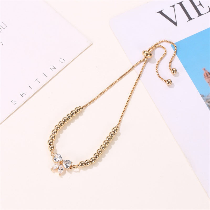 UNI-10484 - Beaded Bow Gold  - Bracelet